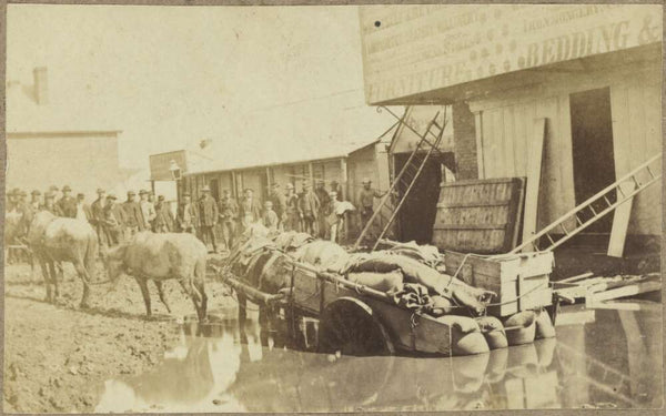 Horses and loaded wagon bogged in what was originally an alluvial test-hole outside William Mears' Criterion Store, Clarke Street, Hill End, New South Wales, winter 1872 https://nla.gov.au:443/tarkine/nla.obj-148019647