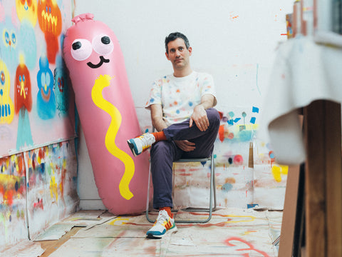 Artist Jon Burgerman and the Hot Diggity Dog Pool Float in the studio