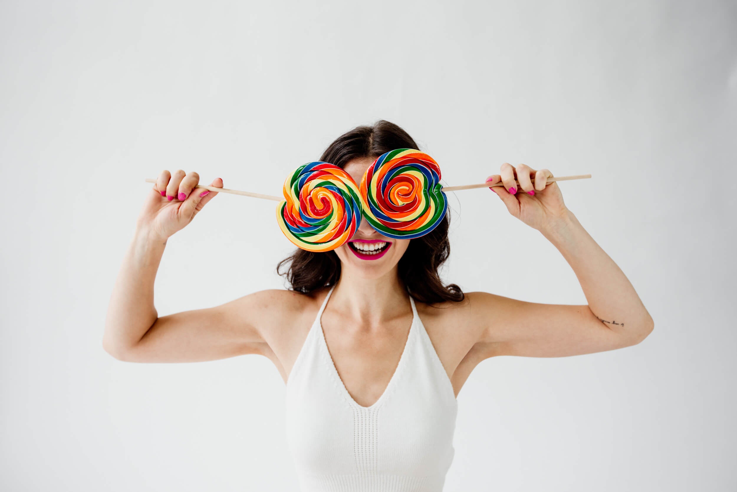 A woman holds up candy