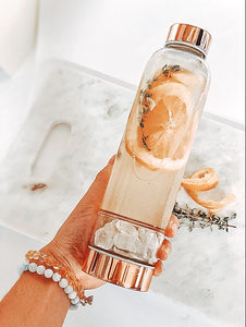 gold glass water bottle