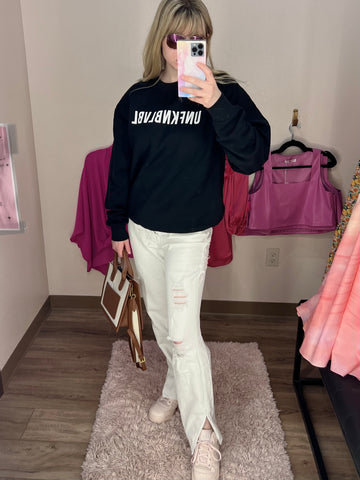 photo of distressed boyfriend white jeans with crew neck sweatshirt