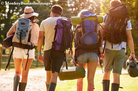 Campers walking at a festival