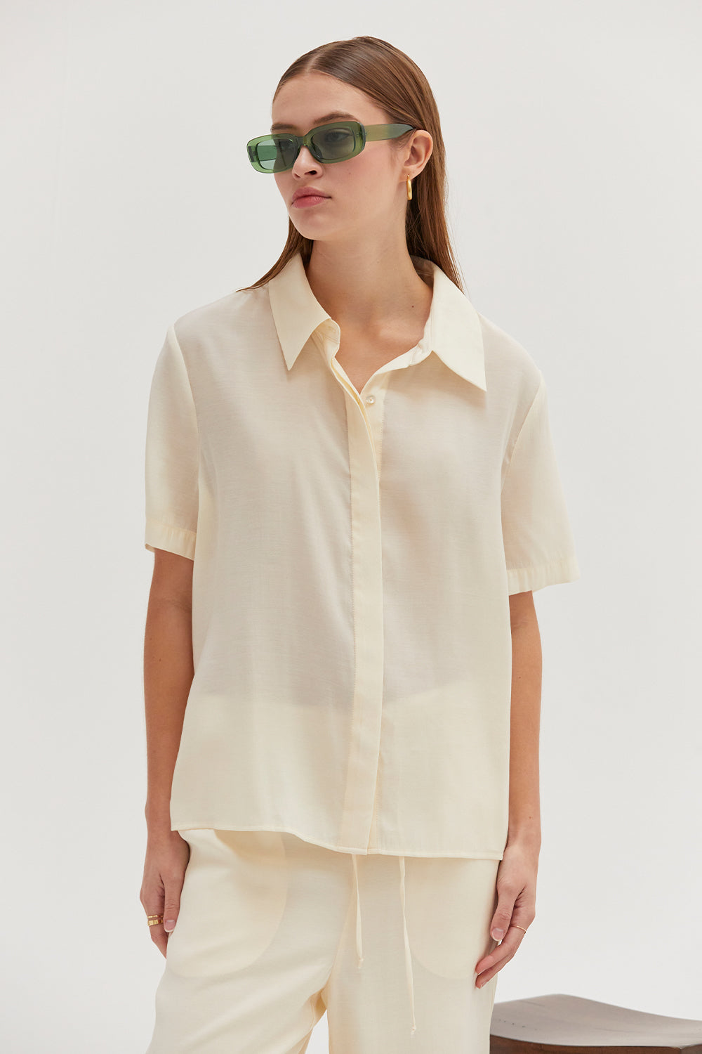 pale button-up shirt