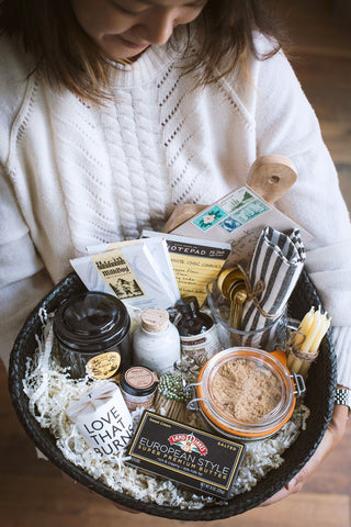 woman holding a gift basket