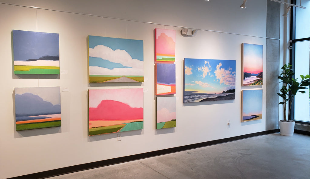 Art gallery with landscape paintings