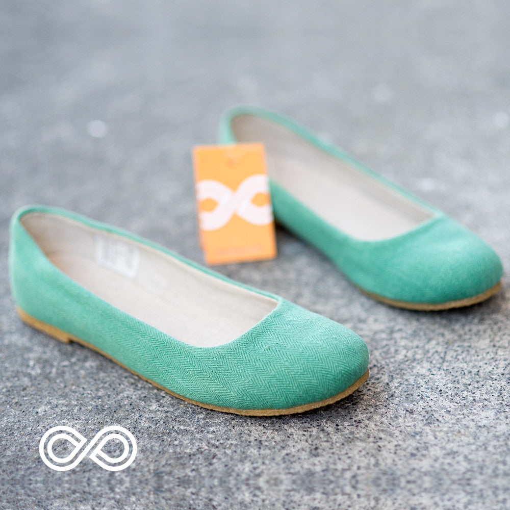 flats with teal soles