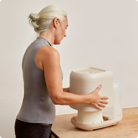 Woman assembling Canopy humidifier