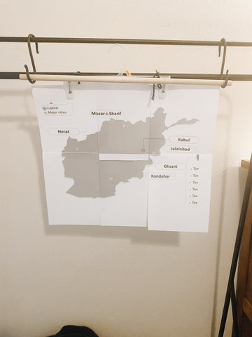 paper map on clothes hanger