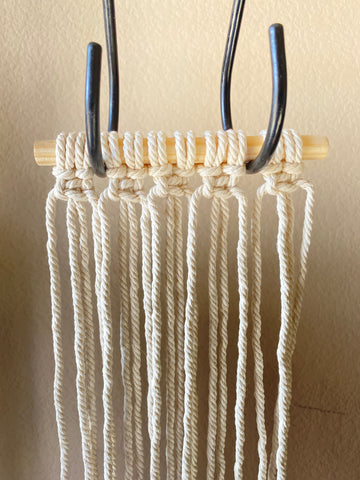 row of square knots