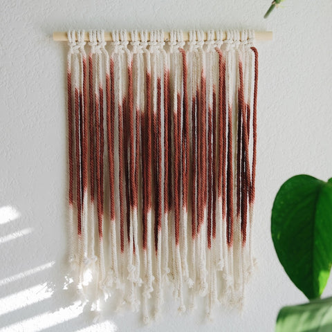 diy dyed wall hanging displayed on wall