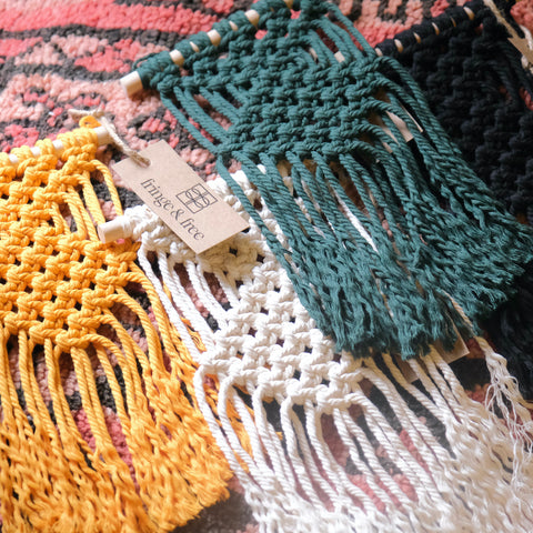 macrame wall hangings in different colors