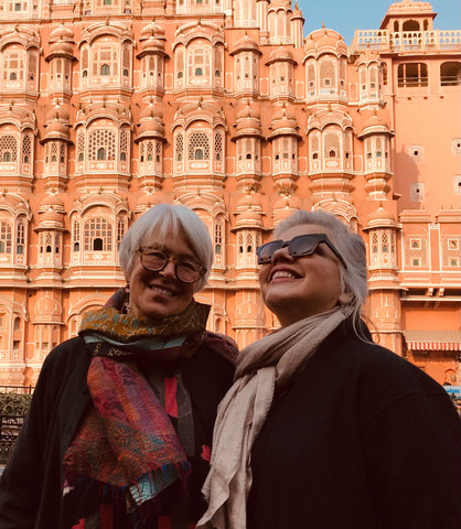 Photo of me and a friend outside the Palace of Winds in Jaipur