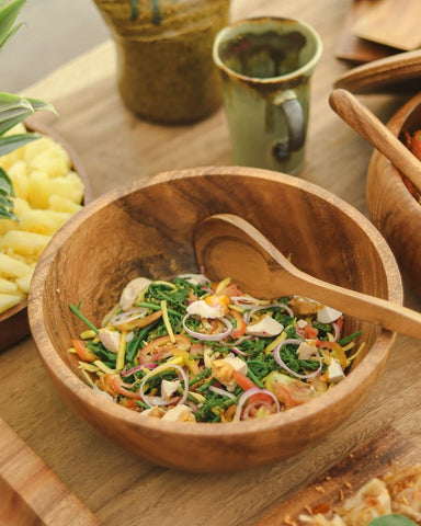 kangkong salad in luid lokal's wooden bowl