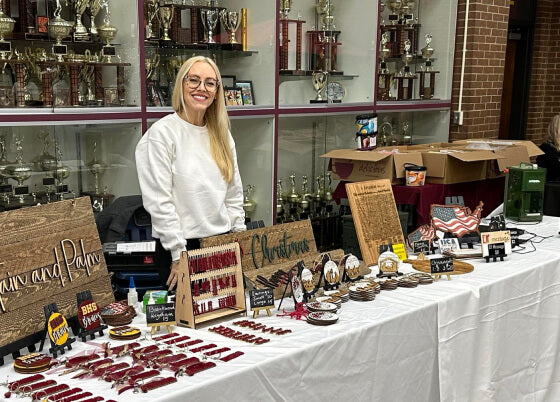 craft show booth full with laser-made wood products