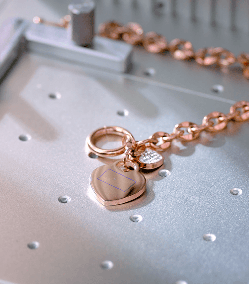 positioning laser point on a heart-shape jewelry