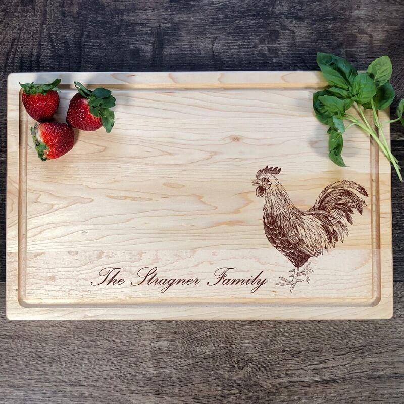 cutting board engraved with farmhouse-themed design