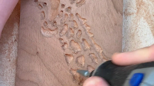 sand inside engraving using the dremel with a sanding bit
