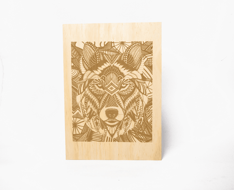 engraving a pattern on wood using laser engraving machine