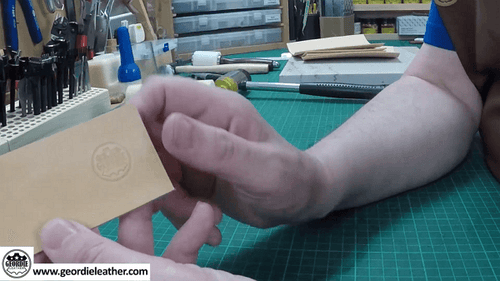 apply pressure to the leather stamp