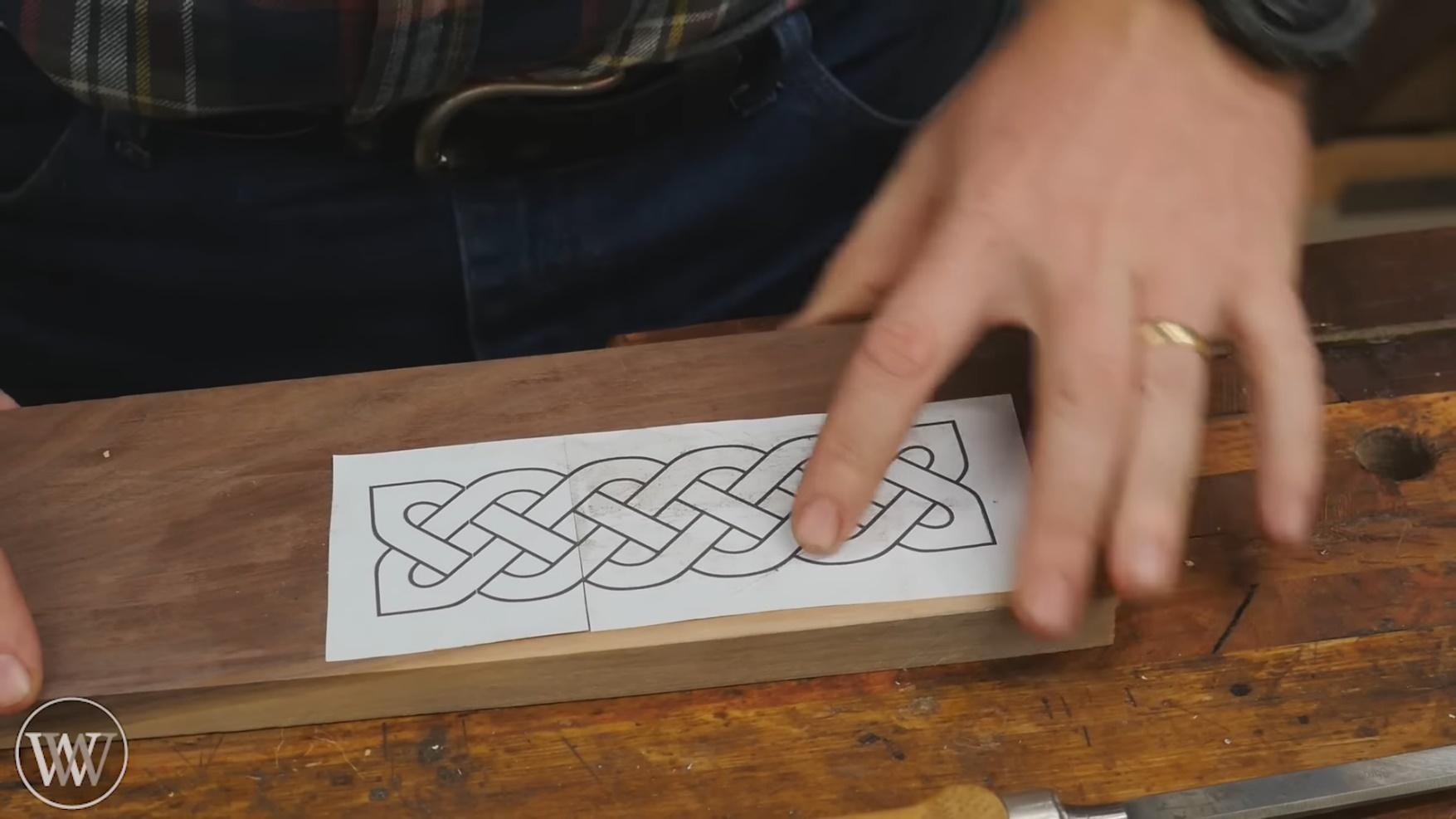 sketch the design onto the wood for hand engraving