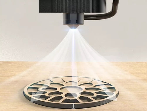 laser cutting wood with an air assist blow away the smoke and particles