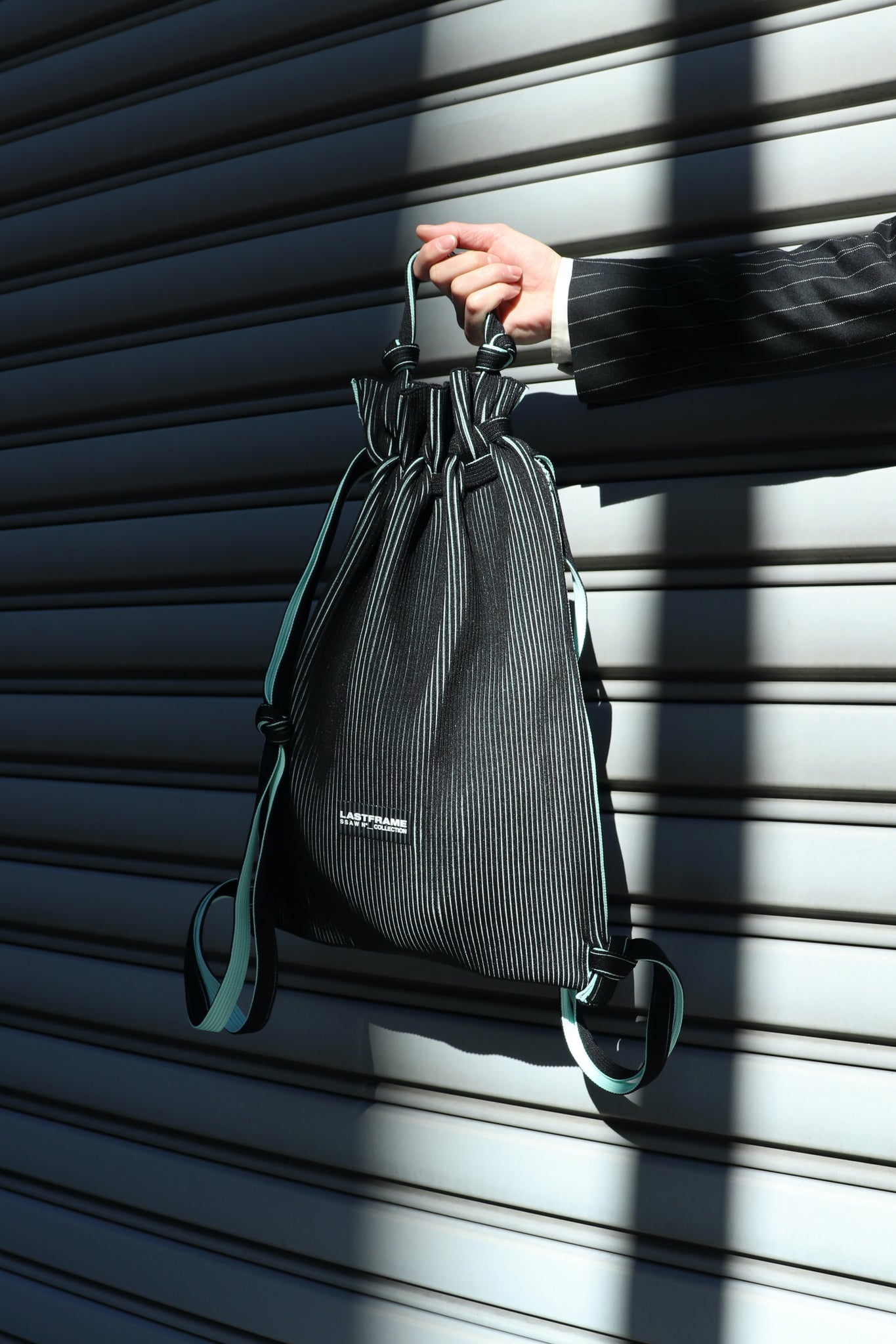 LastFrame's 23SS Two Tone Knapsack BK-Mint Green Wearing image