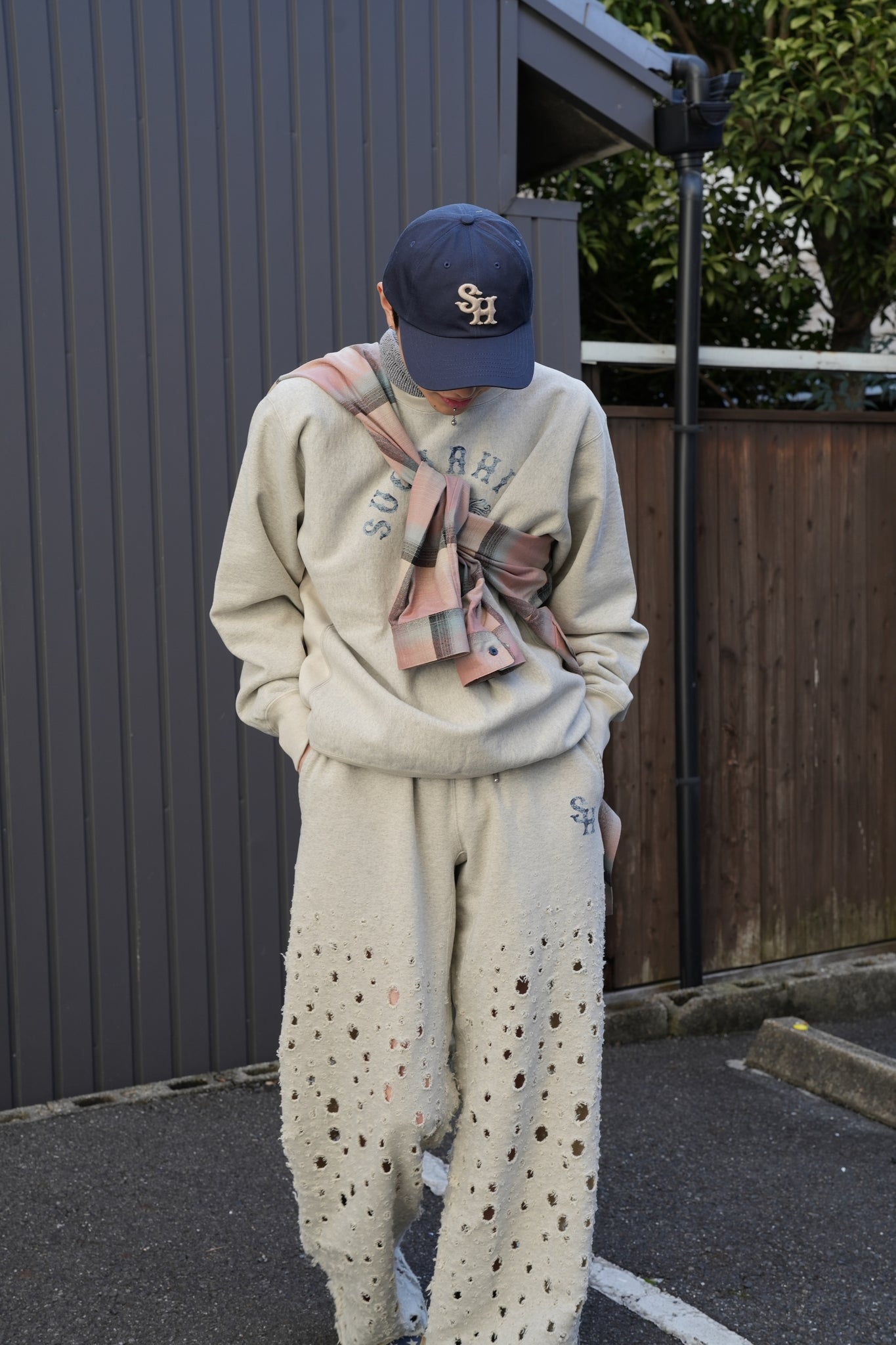 SUGの24ssの CRASHED SWEAT TROUSERS