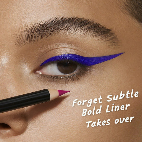 close up of a women with feathered eyebrows and bright blue graphic eyeliner with the words forget subtle bold liner takes over