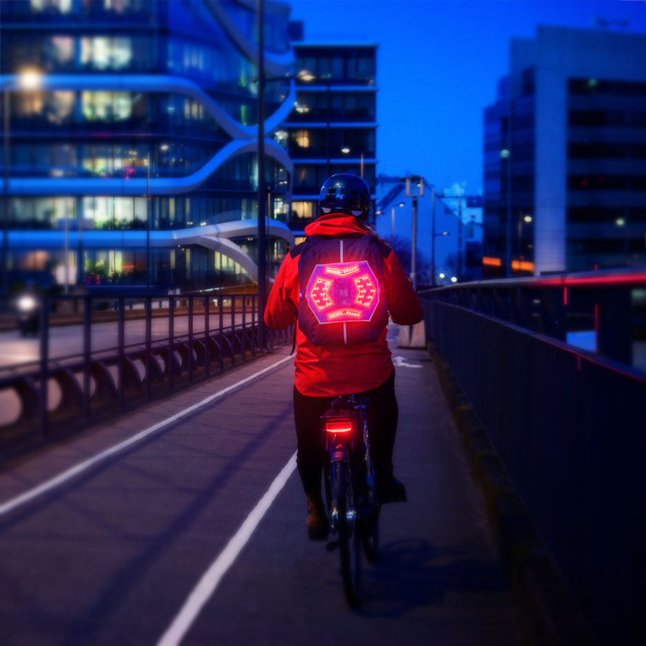 Cyclist with flashing light accessory