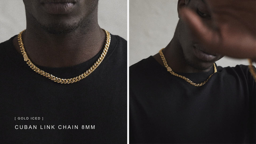 Man wearing a black t-shirt with a Gold ICED Cuban Link Chain