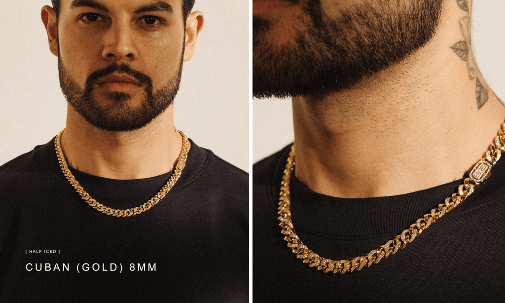 Man wearing a plain black t-shirt and layering an ICED Gold Cuban Link Chain