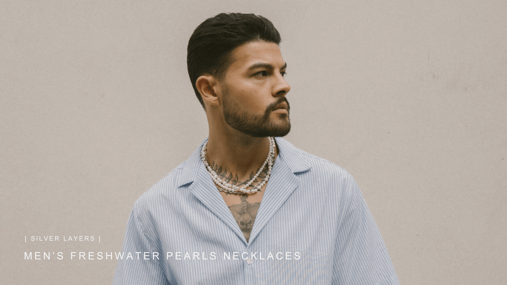 Man wearing a cuban collar shirt wearing silver chains and men's freshwater pearls