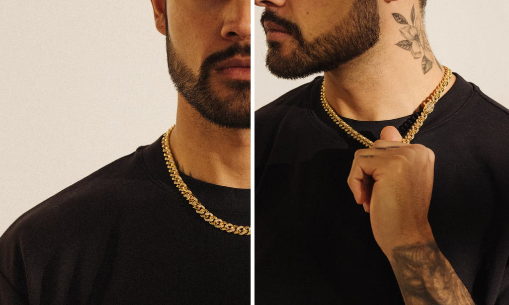 Man wearing a black t-shirt and layering a Gold Cuban Link Chain