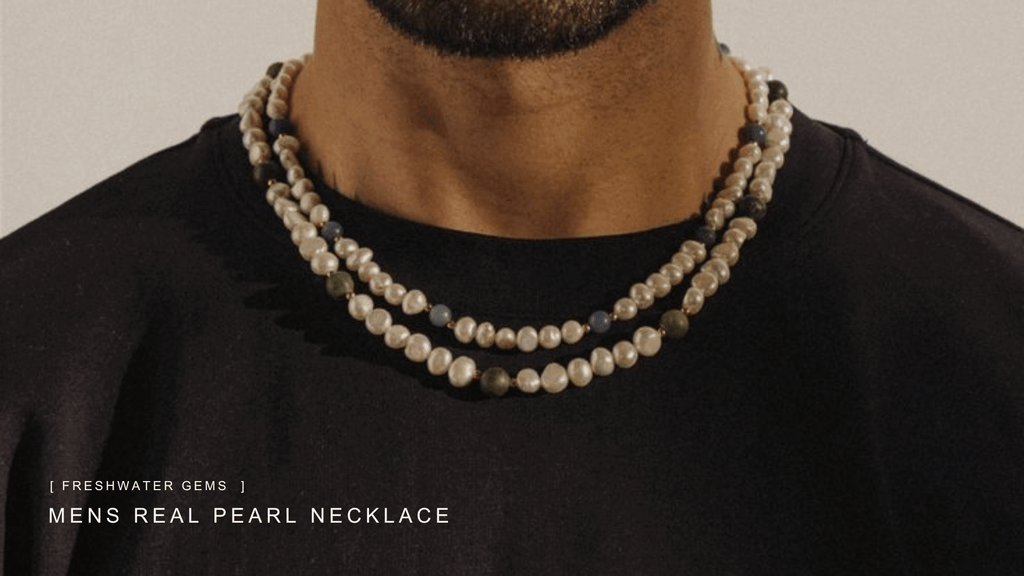 Man wearing a black t-shirt and two sets of mens pearl necklaces with blue and green beads