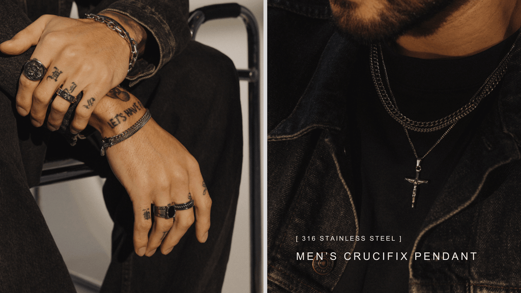 Man sat down on a chair with an up close shot of his hands accessorising his statement silver rings