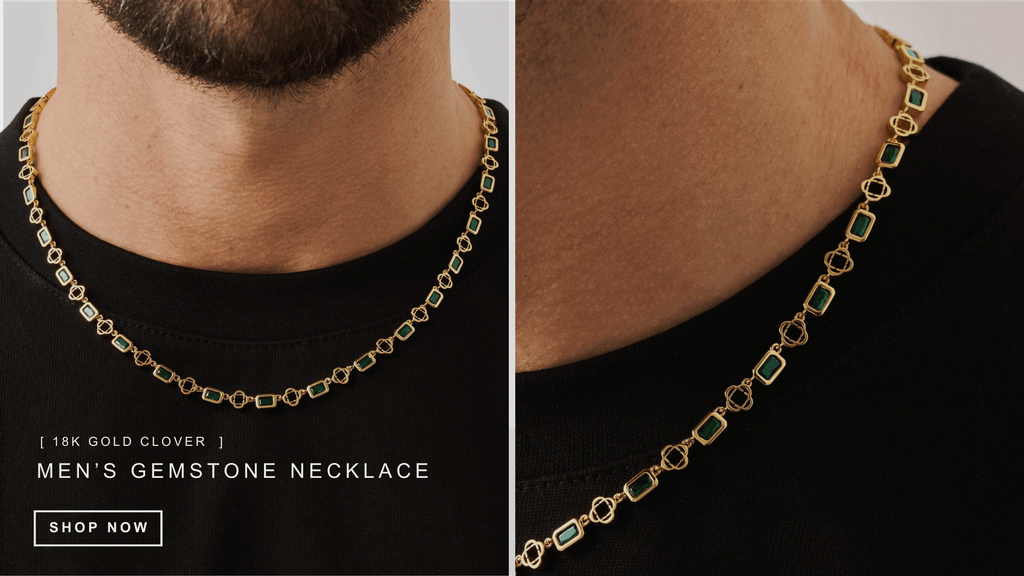 Man wearing a plain black t-shirt and styling a men's gemstone necklace with 18K Gold clover accents