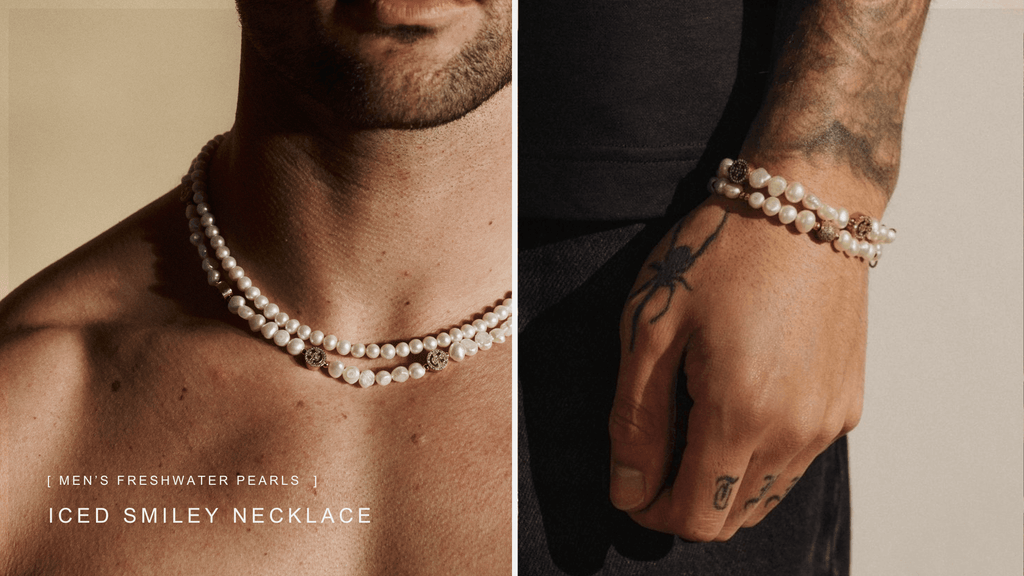 Man styling an ICED freshwater pearl necklace and bracelet set