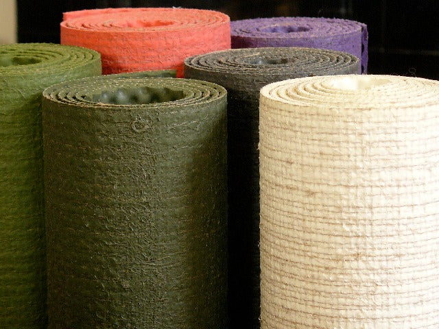 A selection of ecoYoga Mats in a variety of colours