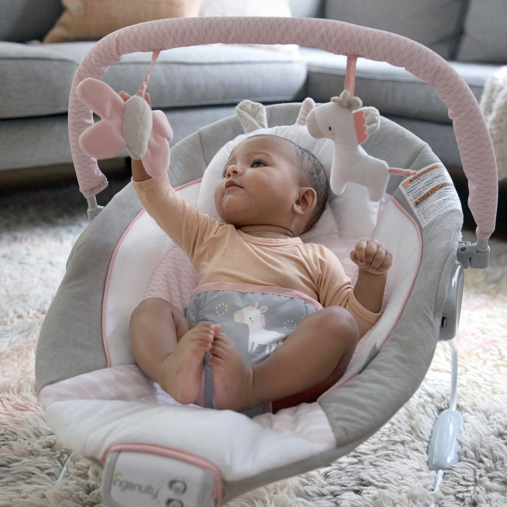 Premium AI Image  A Baby Enjoying a Gentle Rock in a Cozy Cradle