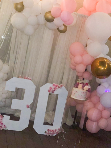 30th birthday party decor with wooden numbers