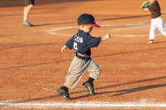 Little boy running to first base, curated by collageandwood.com 