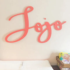nursery name signs: jojo in script lettering