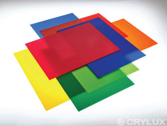 Colored cast acrylic sheets in yellow, green, blue, red and orange colors arranged on top of each other