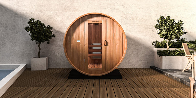 Outdoor barrel sauna in a backyard
