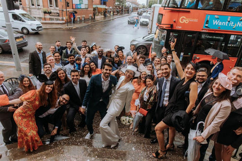 real bride cyma wears awon golding ivory white veiled icon bridal boater group shot