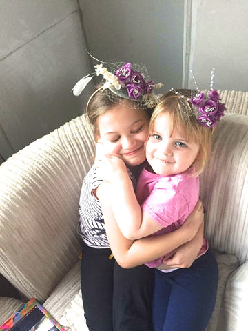 flower girls with their hand made fascinators