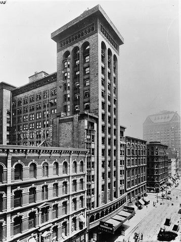 black and white photo of building exterior with ornamentation