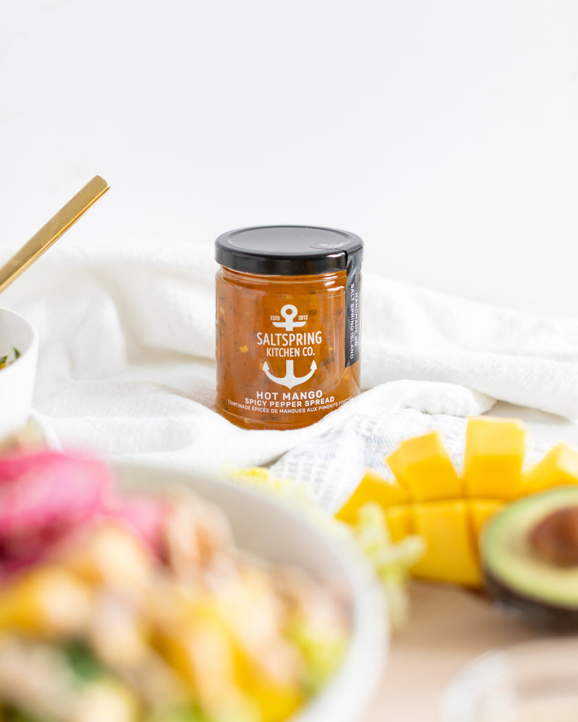 Saltspring Kitchen Company Hot Mango Spicy Pepper Spread - Tori Wesszer and Fraiche Table - a jar as the focal point with the spicy mango bowl in front