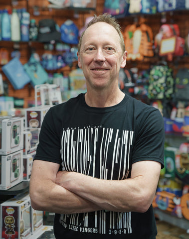 A picture of Colin Mundy, the owner and founder of the Cool Merch company