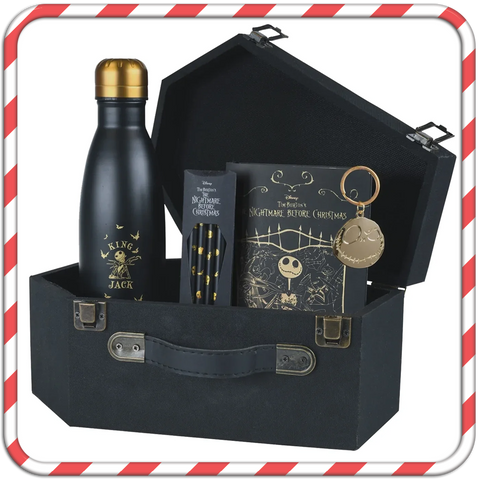 A Nightmare Before Christmas gift set inside a black, wooden, coffin-shaped box.